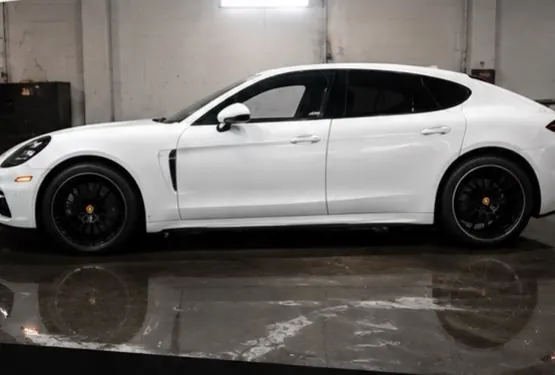 The finished Panamera, side view, inside the shop